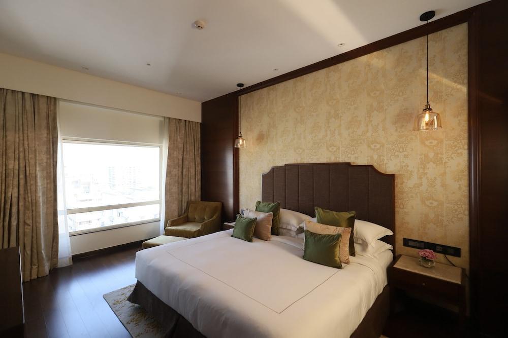 فندق بريزيدنت - آي إتش سي إل سيليكشنز مومباي المظهر الخارجي الصورة A bedroom at the Taj Bengal